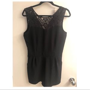 Black romper with lace see through high neckline